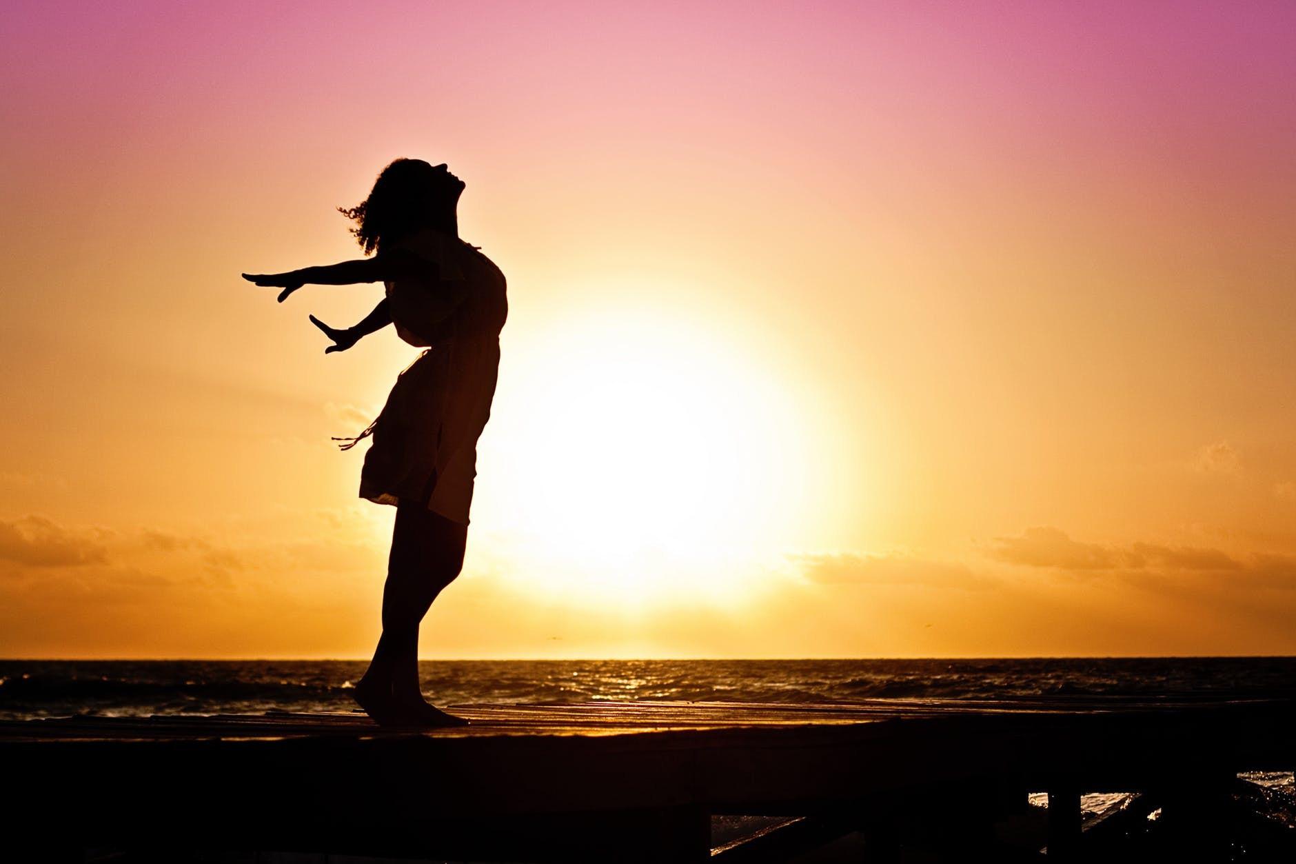 beach woman sunrise silhouette